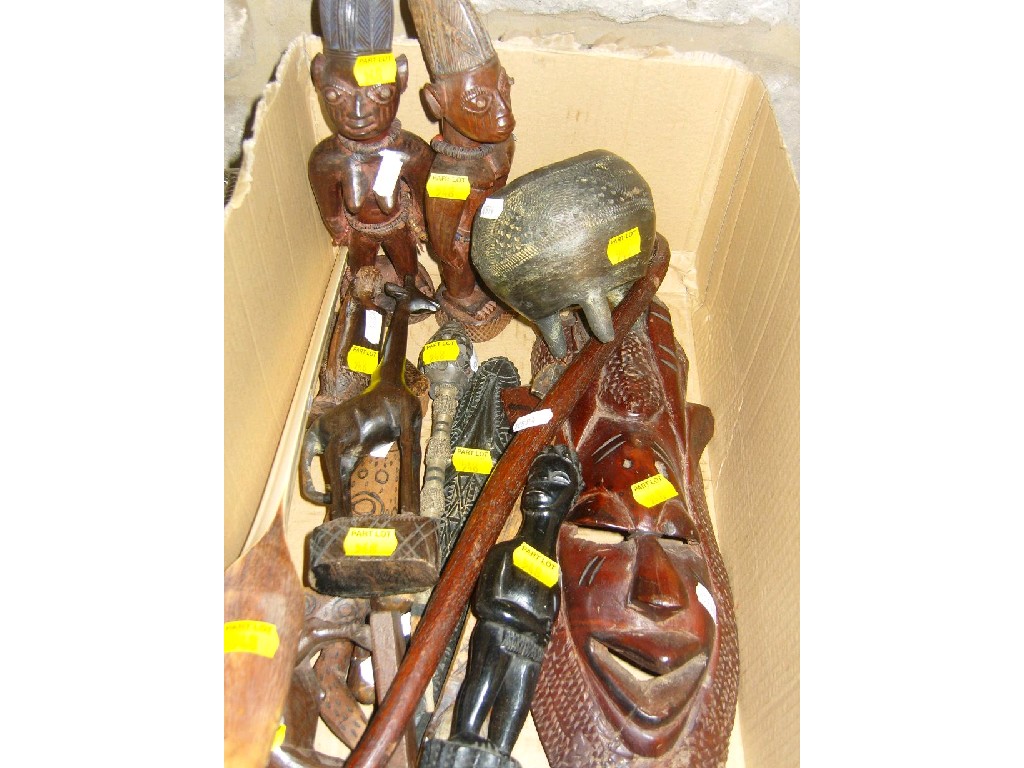 Appraisal: A quantity of African hardwood figures mainly characters but including