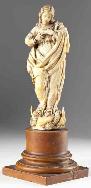 Appraisal: Italian Renaissance Carved Ivory Madonnafigure enveloped in well-carved robe and