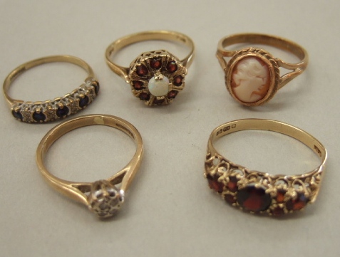 Appraisal: A ct gold garnet and opal set cluster ring a