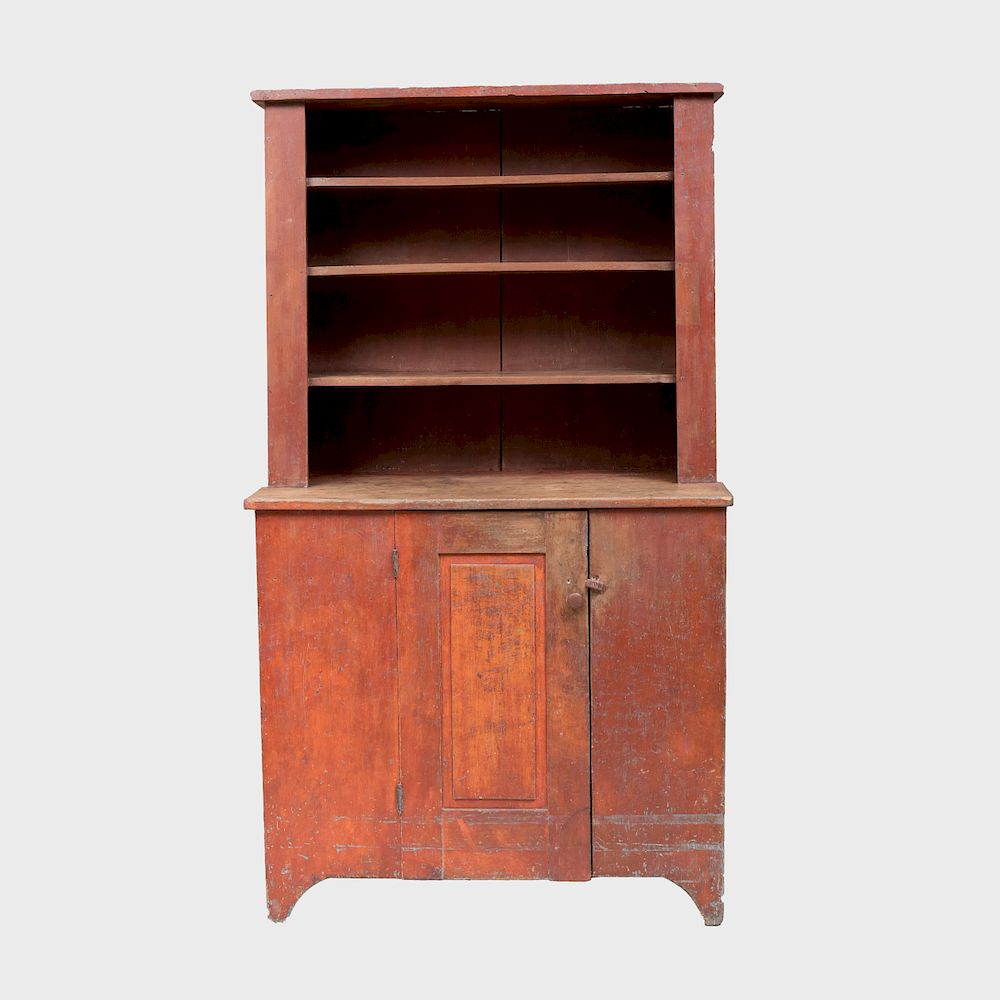 Appraisal: New York Iron Red Painted Stepback Cupboard The upper section