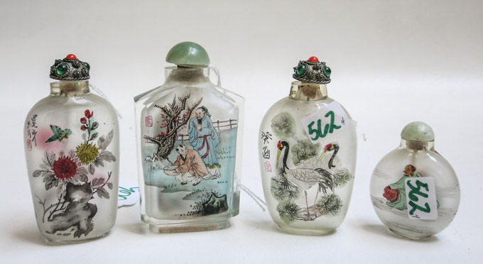 Appraisal: FOUR CHINESE REVERSE PAINTED GLASS SNUFF BOTTLES various forms including