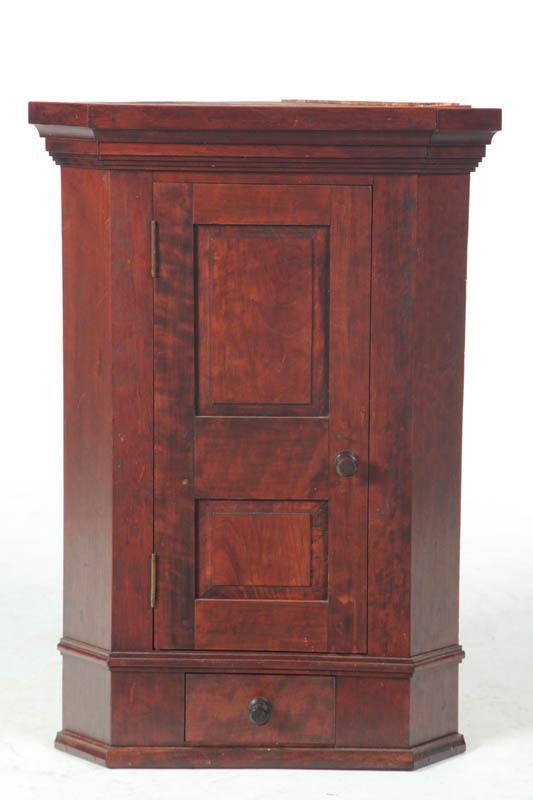 Appraisal: HANGING CORNER CUPBOARD American late th century cherry Unsigned example