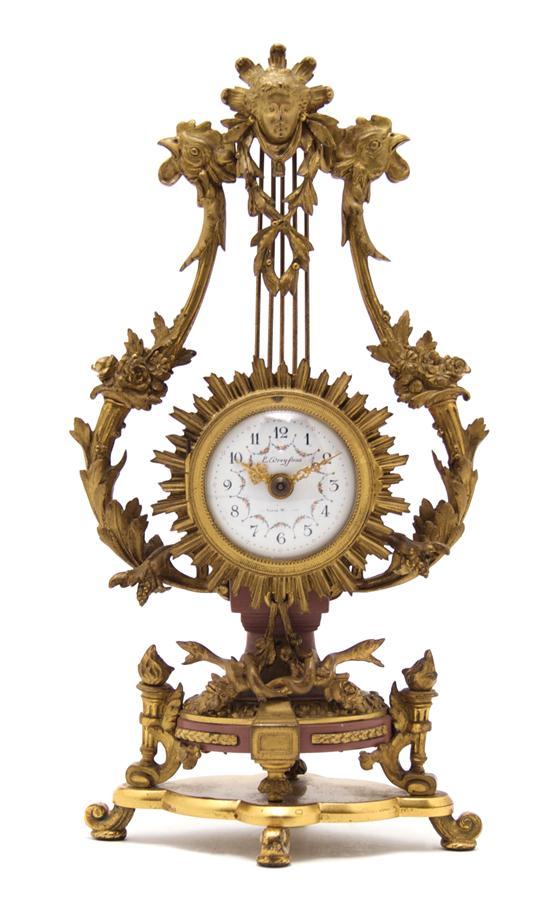 Appraisal: Louis XV Style Gilt Bronze Clock Dreyfous the enameled dial