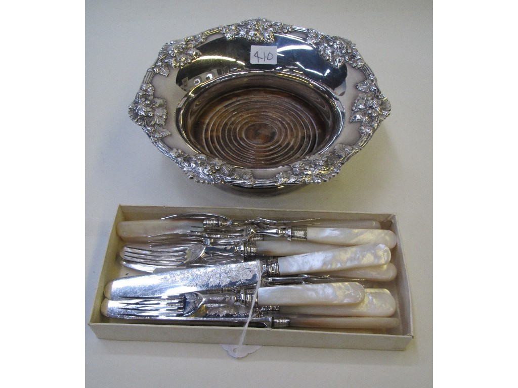 Appraisal: Lot comprising silver plated wine coaster and some mother of