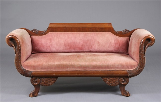 Appraisal: AMERICAN EMPIRE MAHOGANY SOFA th century Cornucopia carving swan-neck roll-over