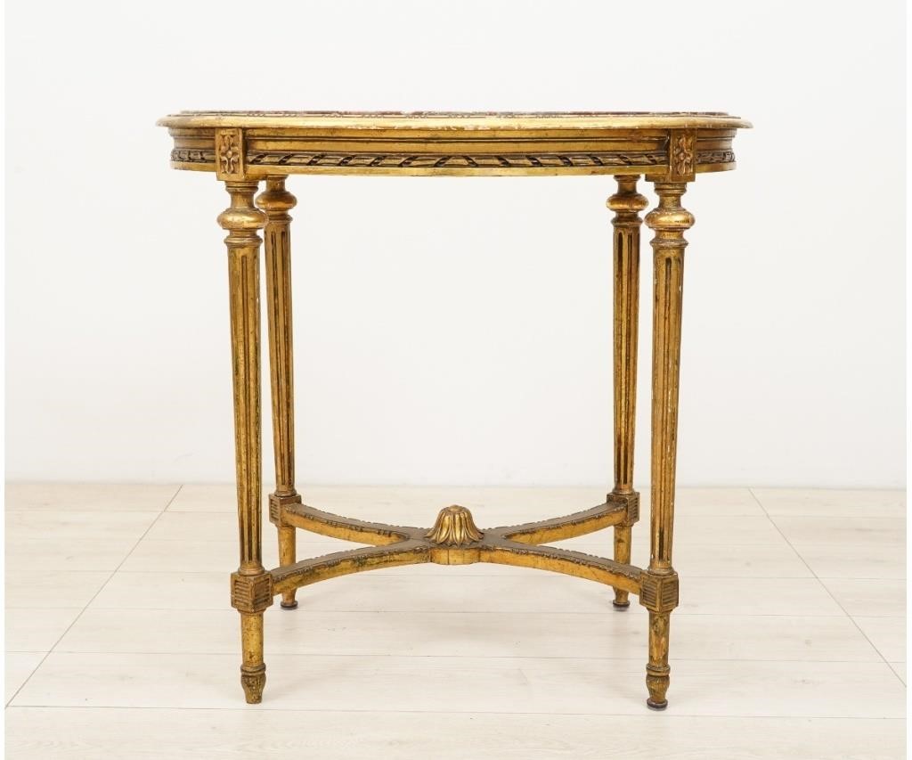 Appraisal: Oval giltwood marble top end table French or Italian style