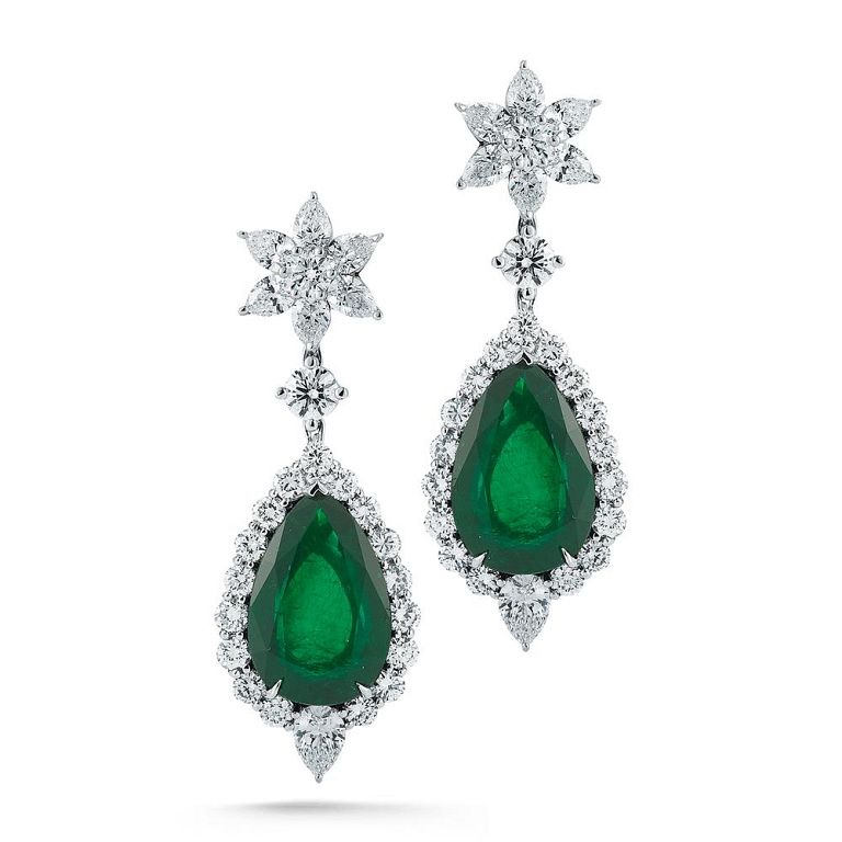 Appraisal: EMERALD AND DIAMOND EARRING EMERALD AND DIAMOND EARRING A star