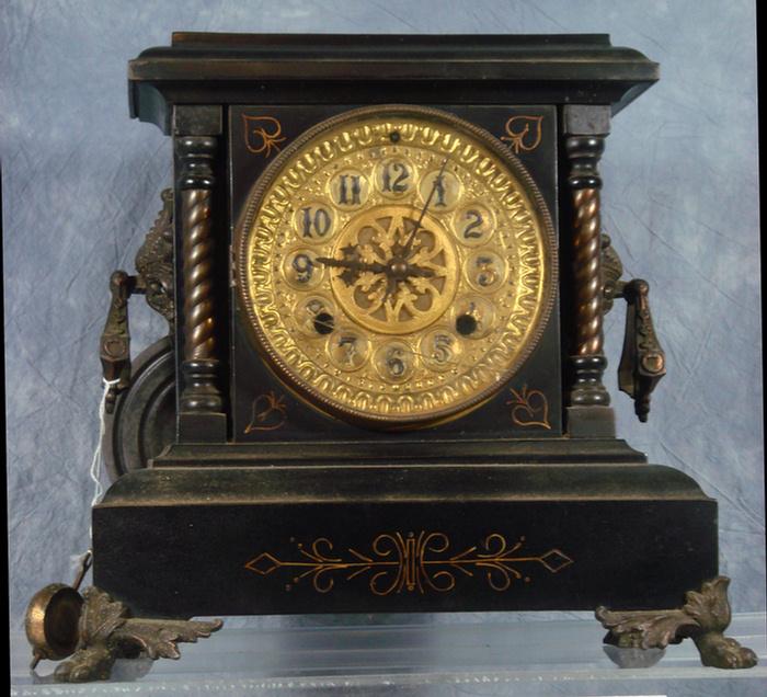 Appraisal: Black iron mantle clock overpainted dial bad spring h Estimate