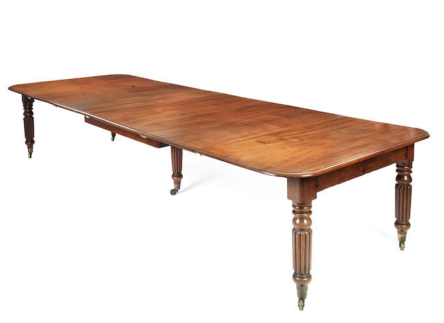 Appraisal: A George IV mahogany extending dining table the rounded rectangular