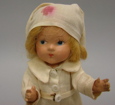 Appraisal: Vogue Toddles WW II Nurse - Composition doll with painted