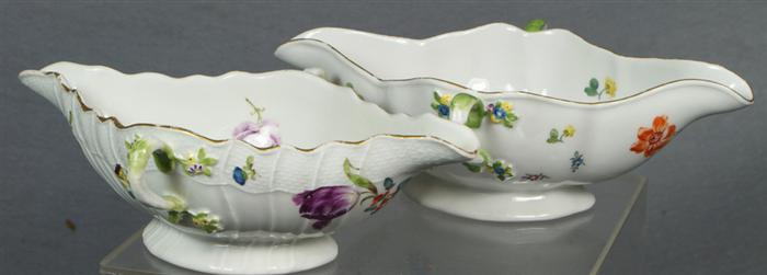 Appraisal: Two assorted Meissen double handled sauce boats with floral decoration