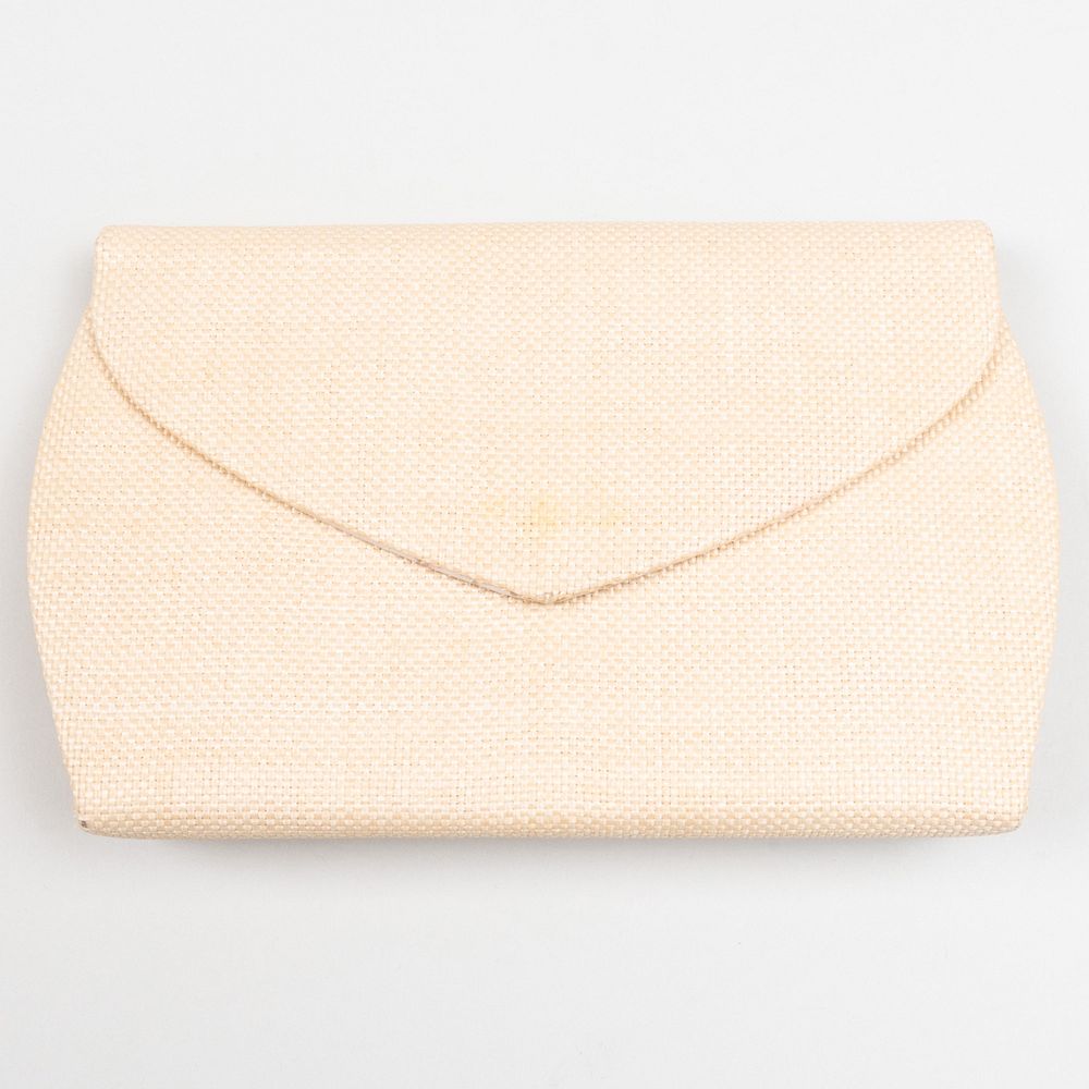 Appraisal: Yves Saint Laurent Cream Fabric Clutch Gilt embossed label x