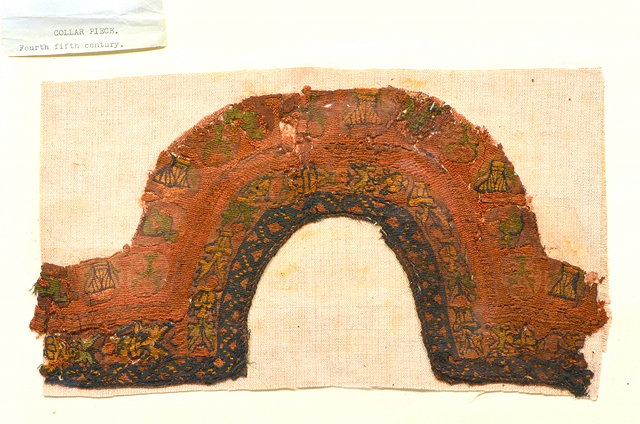 Appraisal: A COLLAR PIECE of arched form with stylistic design on