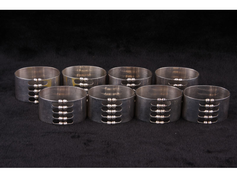 Appraisal: Eight Sterling Napkin Rings Sweden modern design date mark each