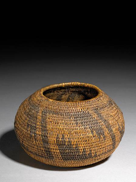 Appraisal: Baskets Woven of natural and black-dyed willow in what appears