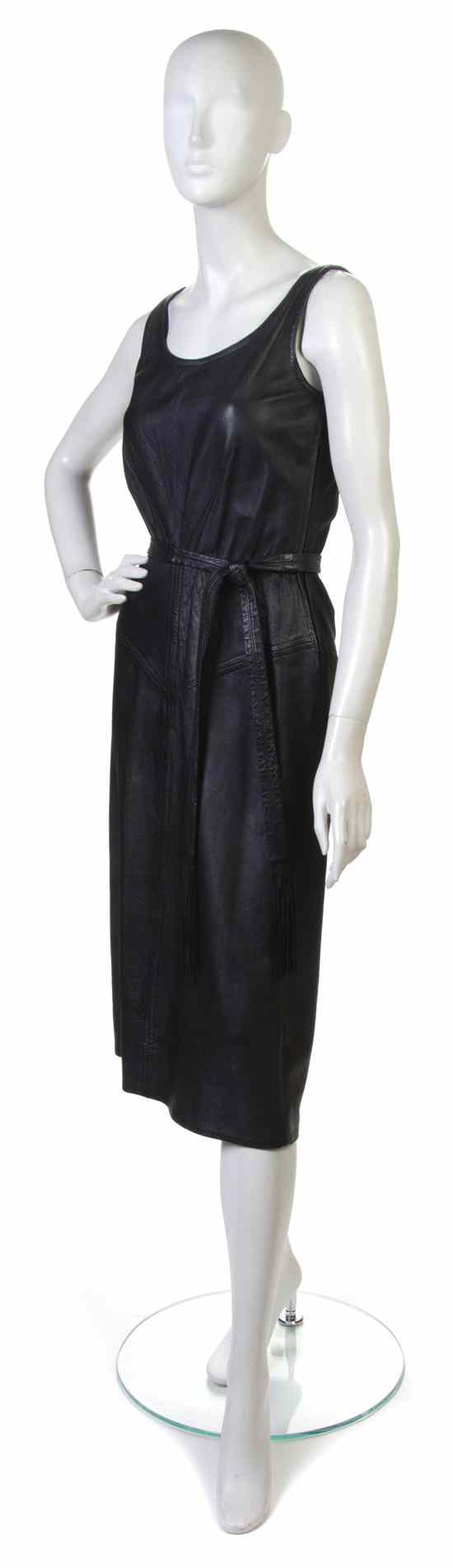 Appraisal: A Black Leather Dress with matching fringe belt Labeled Sara