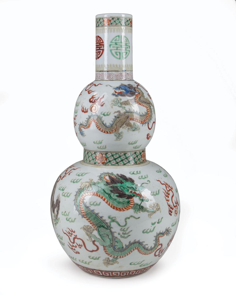 Appraisal: Chinese Wucai Porcelain Double Gourd Vase decorated with dragons pursuing