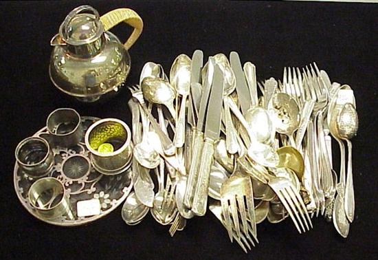 Appraisal: Silverplate including oblong tray with gallery extension trivet napkin rings