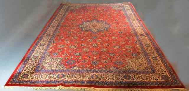 Appraisal: A FINE HAND-MADE SAROUK WOOL CARPETCoral and light blue field