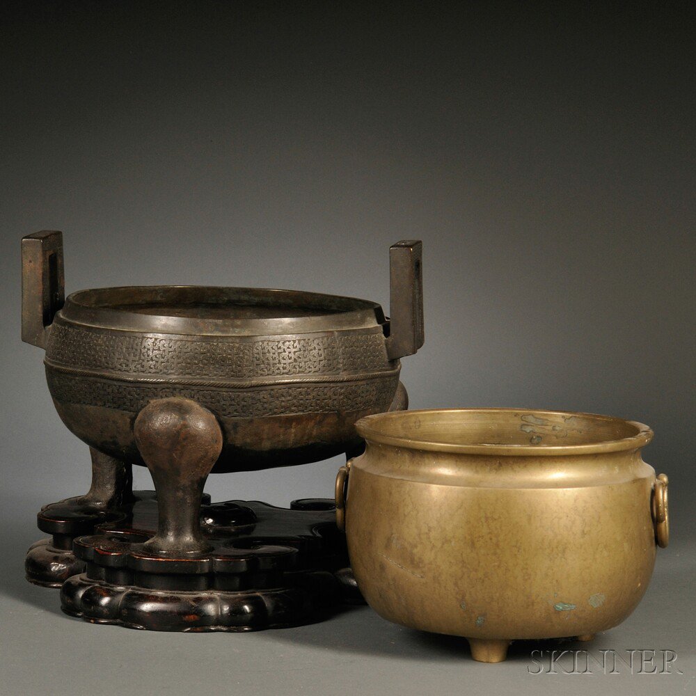 Appraisal: Two Metal Vessels China a bronze archaic-style tripod vessel decorated