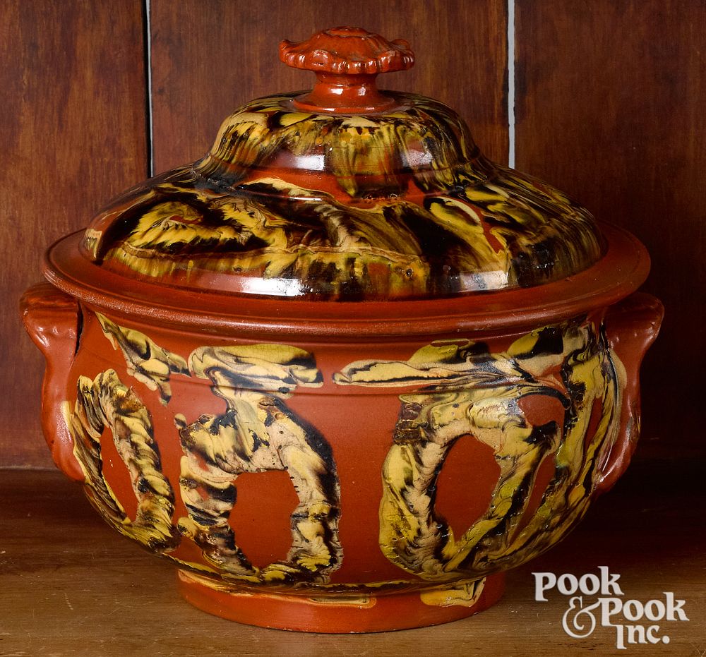 Appraisal: Mocha redware covered pot Mocha redware covered pot with earthworm