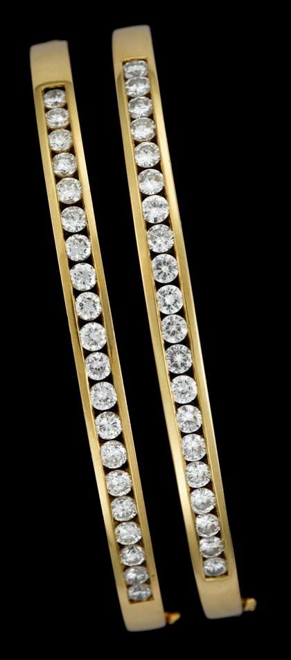 Appraisal: Double diamond bangle bracelets karat yellow gold bangles each displaying