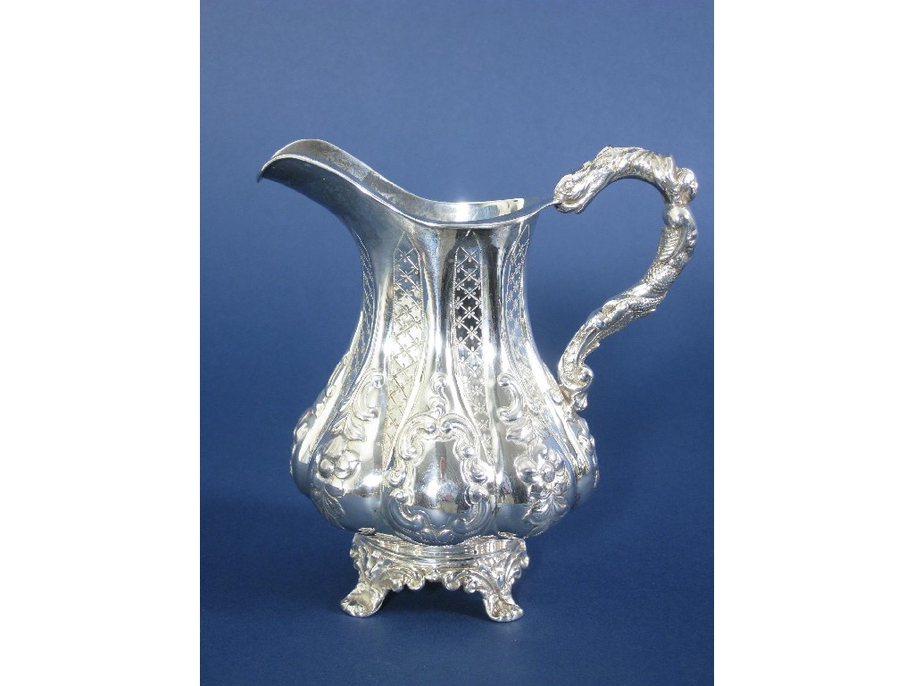 Appraisal: A Victorian Milk Jug of lobed circular form floral embossed