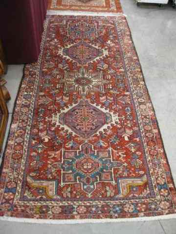 Appraisal: Heriz Persian Handmade Rug five geometric medallion floral border red