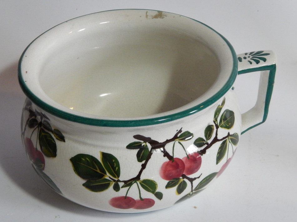 Appraisal: A thC Wemyss Pottery chamber pot the inverted circular body