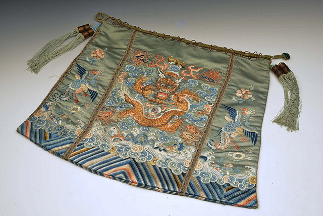 Appraisal: A CHINESE PALE BLUE SILK LARGE RETICULE with embroidered dragon