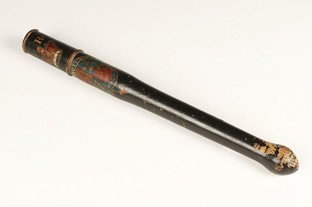 Appraisal: A GEORGE IV EBONISED TRUNCHEON with royal coat of arms