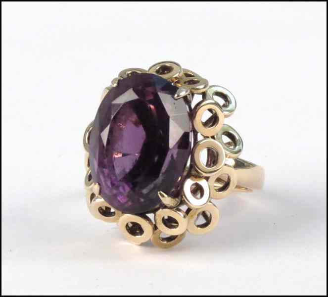 Appraisal: KARAT YELLOW GOLD AND AMETHYST RING Amethyst is approximately carats