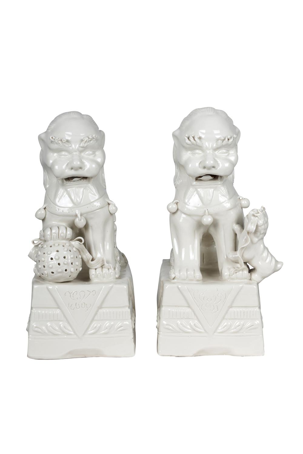 Appraisal: PAIR OF DECORATIVE CERAMIC FOO LIONSunsigned white-glazed each inches wide