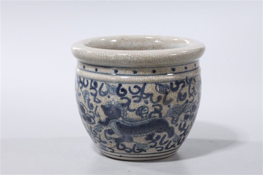 Appraisal: Korean blue and white crackle glazed jar with qilin motif