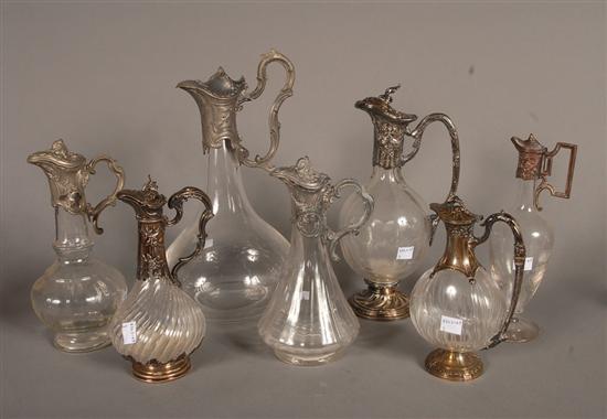 Appraisal: GROUP CLARET JUGS Continental silver and pewter mounted One as