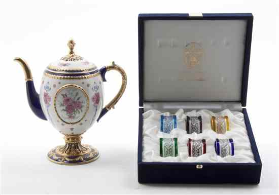 Appraisal: A Cased Set of Six Faberge Cut Glass Napkin Rings