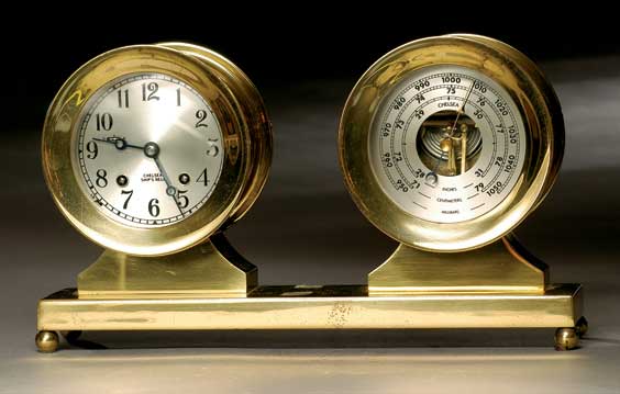 Appraisal: AMERICAN CLOCK AND BAROMETER SET Old American brass Ocean Pride