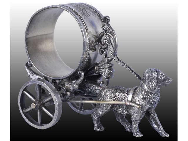 Appraisal: Dog Pulling Figural Napkin Ring On Wheels Description Marked Simpson