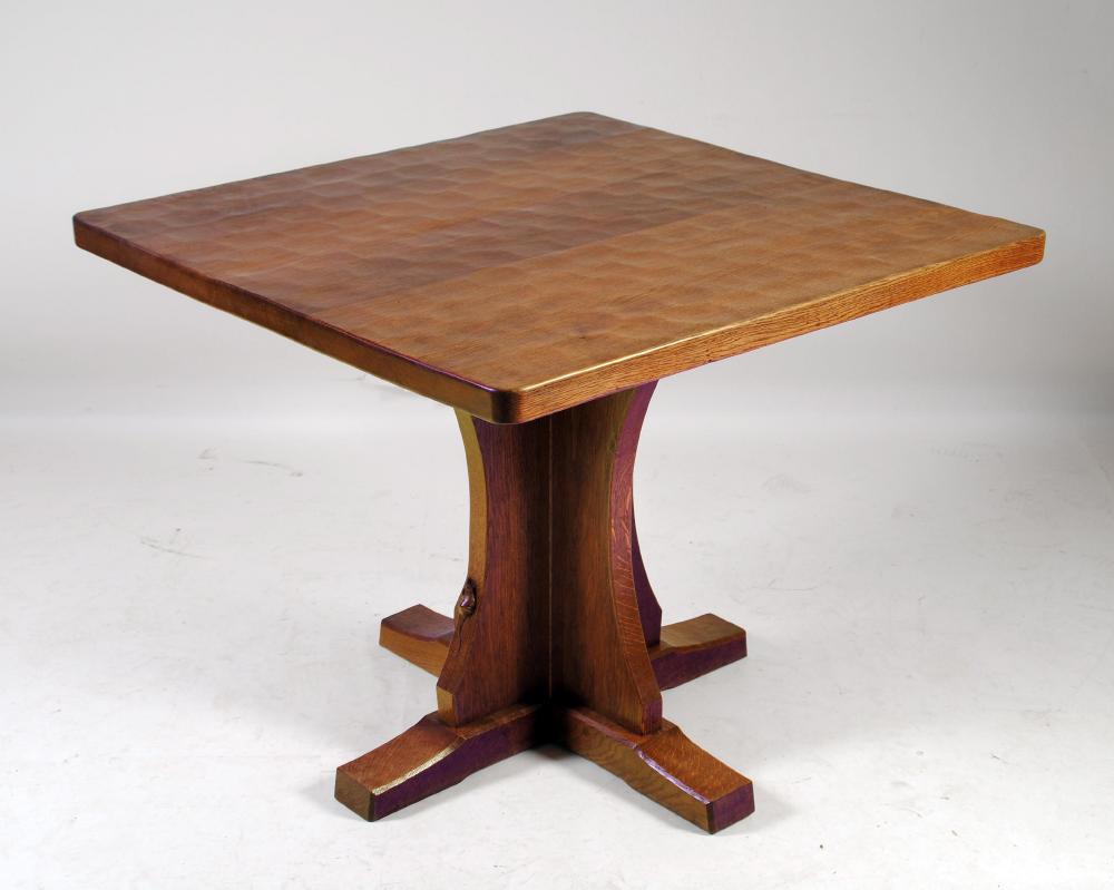 Appraisal: AN ADZED OAK BREAKFAST TABLE by Robert Mouseman Thompson of