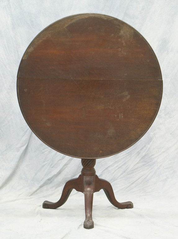 Appraisal: Mahogany dishtop tilt top tea table birdcage support fluted pedestal