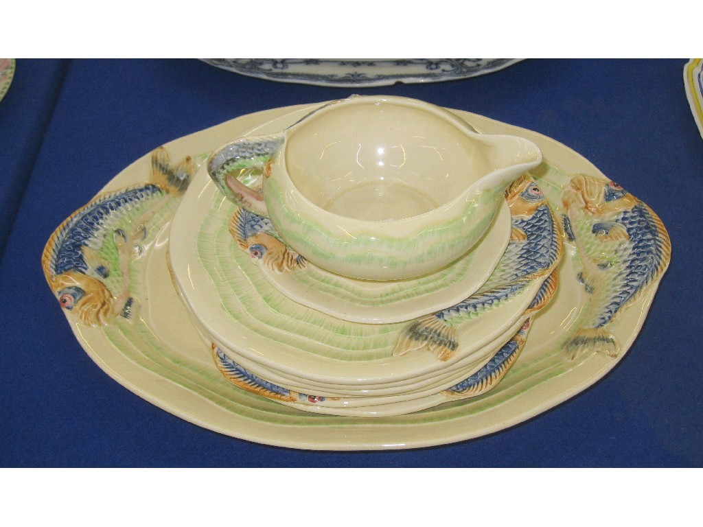 Appraisal: Clarice Cliff Newport pottery fish set comprising platter plates sauceboat