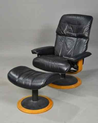 Appraisal: EKORNES NORWEGIAN BLACK LEATHER CHAIRStylish Ekornes contemporary ''Stressless'' collection black