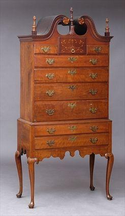 Appraisal: NEW ENGLAND INLAID CHERRY HIGHBOY The swan's neck dentil crest