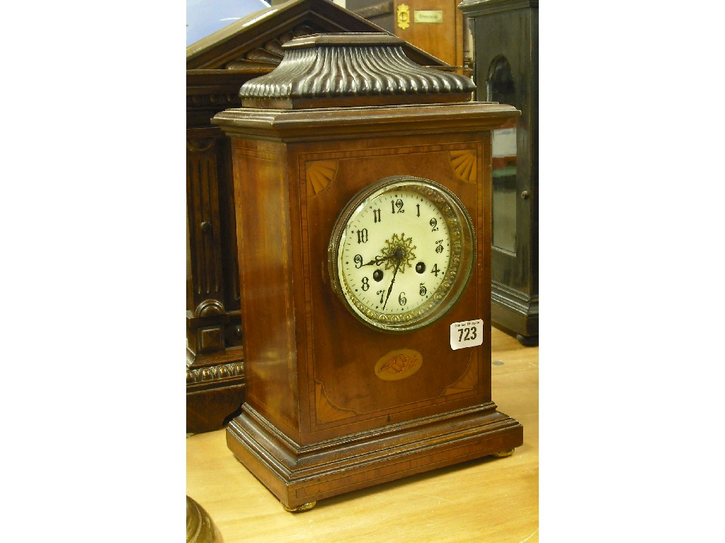 Appraisal: French mahogany two train mantel clock the movement striking on