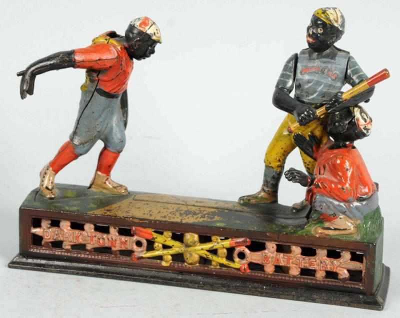 Appraisal: Cast Iron Darktown Battery Mechanical Bank Manufactured by J E