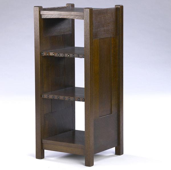 Appraisal: GUSTAV STICKLEY Early magazine stand with V aprons paneled sides