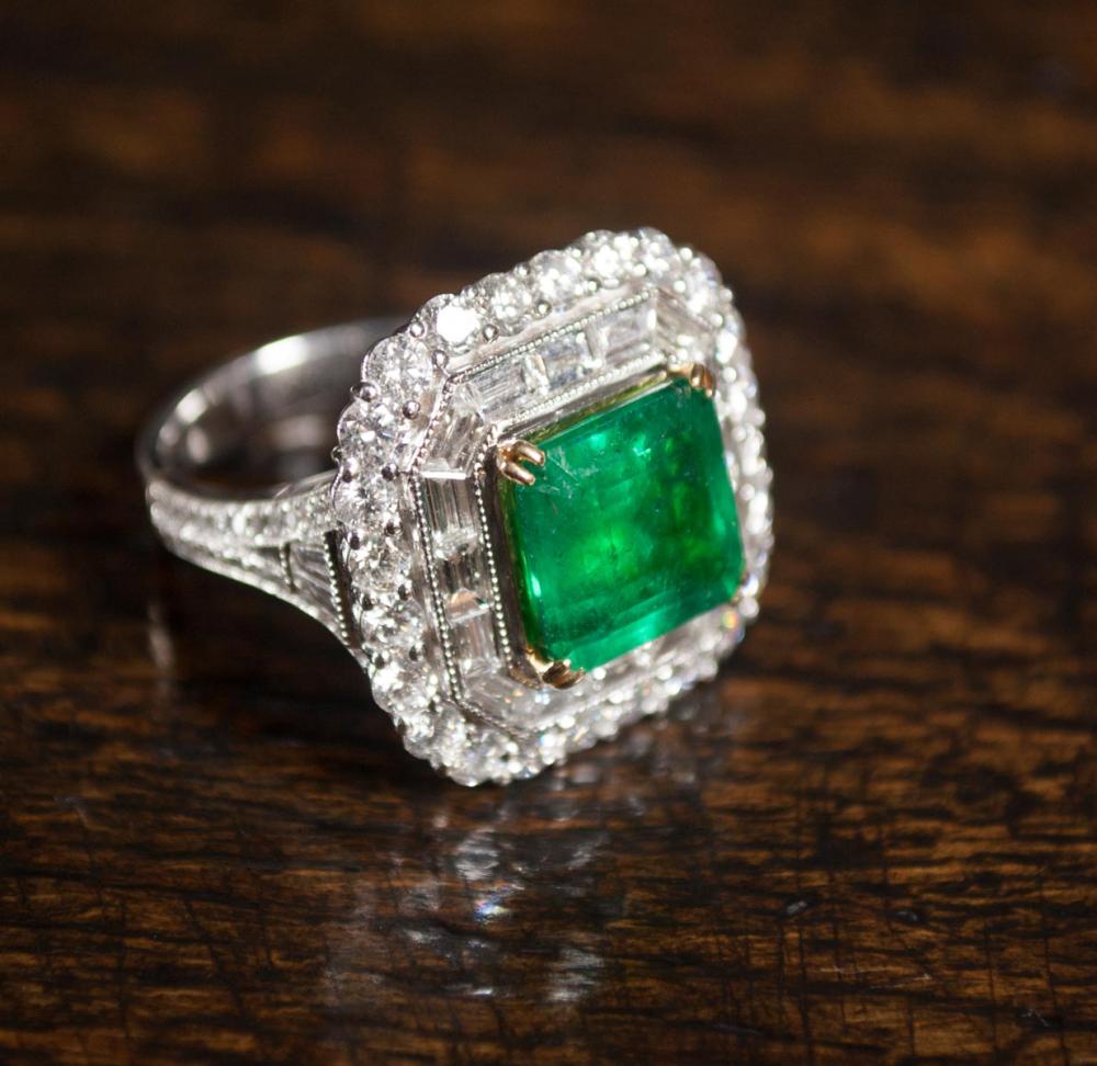 Appraisal: EMERALD DIAMOND AND EIGHTEEN KARAT GOLD RING WITH GIA EMERALD