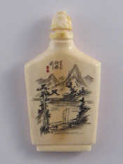 Appraisal: A Chinese ivory snuff bottle engraved with a mountain scene