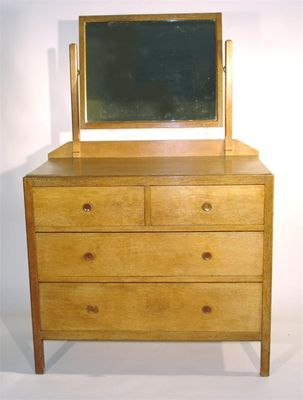 Appraisal: Heals limed oak chest of drawers with fitted dressing mirror