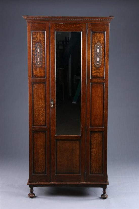 Appraisal: ARTS CRAFTS ARMOIRE early th century Jacobean revival Egg-and-dart molded